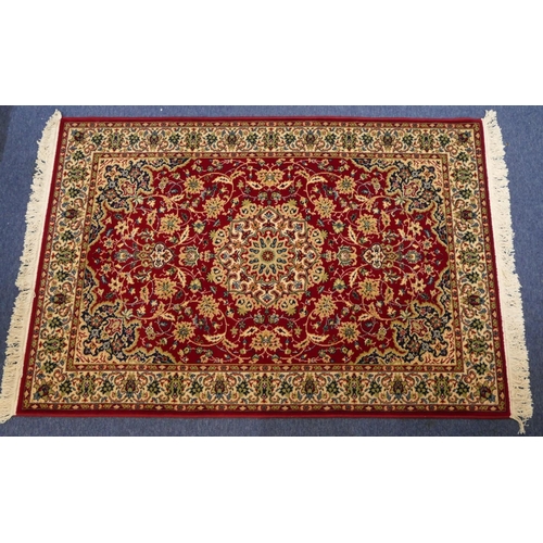 711 - A modern Persian rug on cream and blue ground with centre medallion, 185cm x 126cm