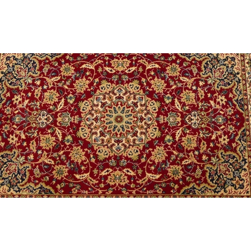 711 - A modern Persian rug on cream and blue ground with centre medallion, 185cm x 126cm