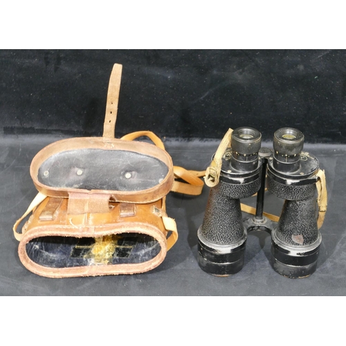 725 - A pair of Bino prism number 5 mk III x 7 binoculars, dated 1941, in fitted leather case.