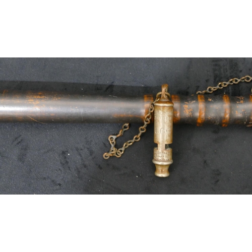 726 - An ebonised truncheon and J Hudson & Co 