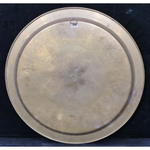 732 - An Eastern circular tray with raised silvered and copper decoration, 39.5cm diameter.