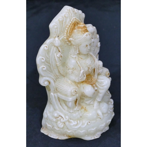 736 - A chinese jade style figure of a seated goddess, 15cm high.