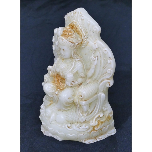 736 - A chinese jade style figure of a seated goddess, 15cm high.