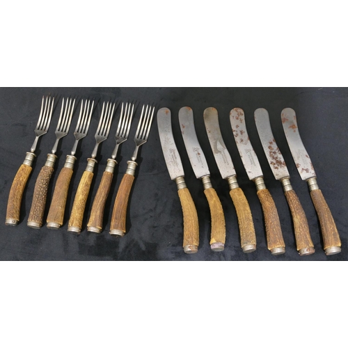 746 - A set of 6 Anton Wingen, Solingen horn handled dinner knives and 6 matching forks