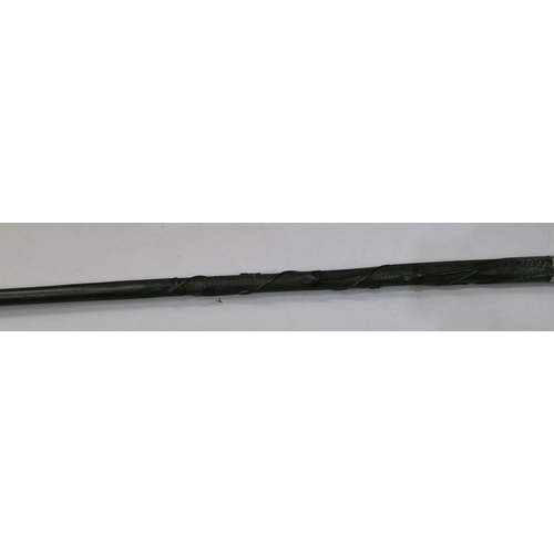 748 - An ebony walking cane with a Birmingham silver buckle neck, raised carved twist leaf decoration, 92.... 