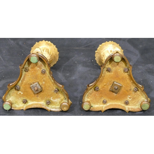 759 - A pair of bronze and ormolu candlesticks in the form of 3 swans on tripod base with bun feet, 17cm h... 