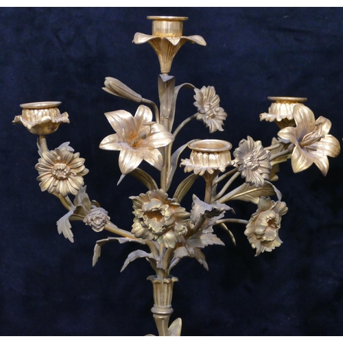 760 - A pair of 19th Century bronze and ormolu candelabras in the form of cupids with allover raised flora... 