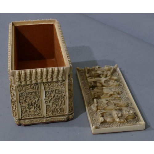 762 - A resin rectangular shaped box with cover, allover Oriental figure decoration, 30cm wide, 16cm high.