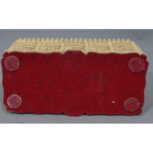 762 - A resin rectangular shaped box with cover, allover Oriental figure decoration, 30cm wide, 16cm high.