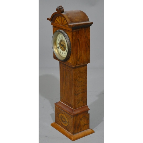 773 - A miniature table top longcase clock with allover marquetry and inlaid decoration, cream chapter rin... 