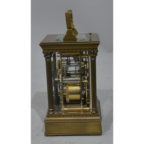 776 - A French brass L'Epee half strike repeating brass carriage clock with Corinthian column supports, wh... 