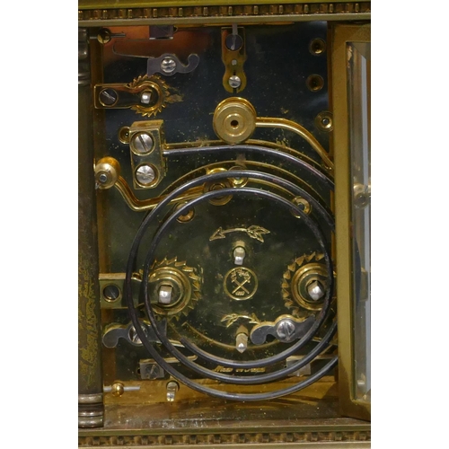 776 - A French brass L'Epee half strike repeating brass carriage clock with Corinthian column supports, wh... 