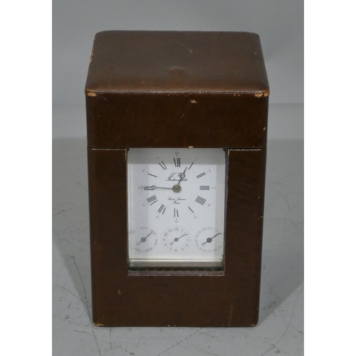 776 - A French brass L'Epee half strike repeating brass carriage clock with Corinthian column supports, wh... 