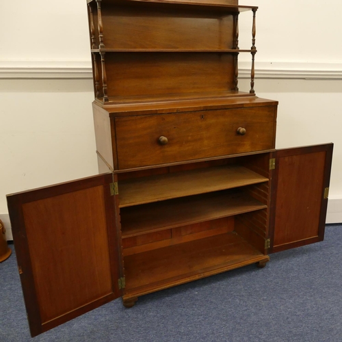 786 - A 19th Century mahogany secretaire chiffonier with shelfed top and turned supports, fitted secretair... 