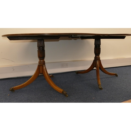 789 - A 19th Century mahogany D-end double pedestal dining table with extra leaf, ebony stringing on 2 tur... 