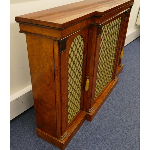 807 - A 19th Century burr maplewood break front low sideboard with carved scroll mounts, centre brass fret... 