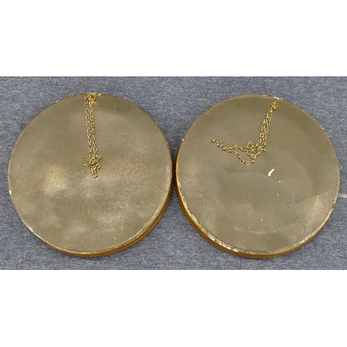 810 - A pair of gilt plaster circular convex wall mirrors with inner ball motifs and black reeded rims, 43... 