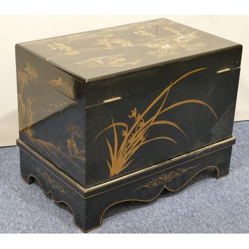 813 - A good quality reproduction Oriental black lacquered rectangular shaped small trunk on black ground ... 