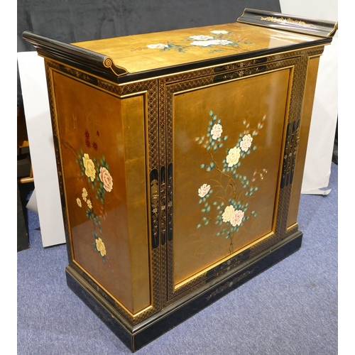 814 - A good quality reproduction Oriental lacquered cocktail cabinet on gilt and black ground with allove... 