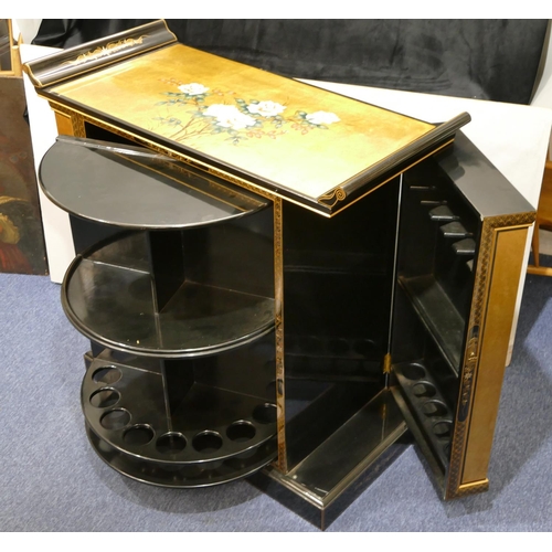 814 - A good quality reproduction Oriental lacquered cocktail cabinet on gilt and black ground with allove... 