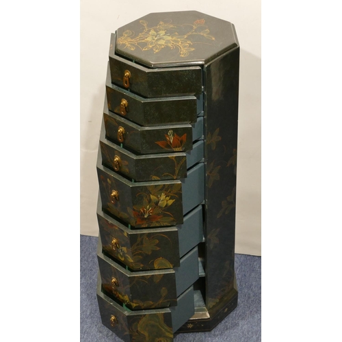 815 - A reproduction Oriental octagonal shaped chest on green ground with allover gilt decoration, 8 gradu... 