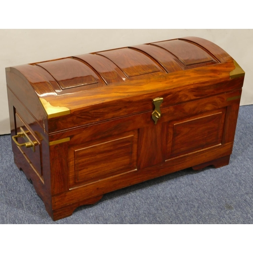 816 - A good quality reproduction Oriental hardwood dome topped trunk with allover gilt and metal mounts, ... 