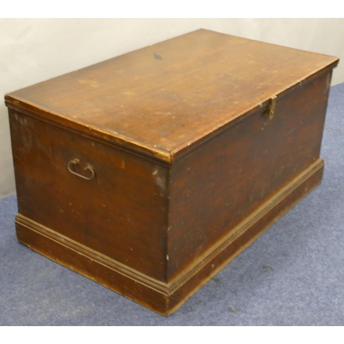 817 - A 19th Century mahogany rectangular shaped trunk with wrought iron carrying handles, hinged lid encl... 