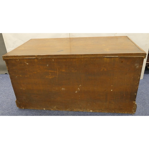 817 - A 19th Century mahogany rectangular shaped trunk with wrought iron carrying handles, hinged lid encl... 