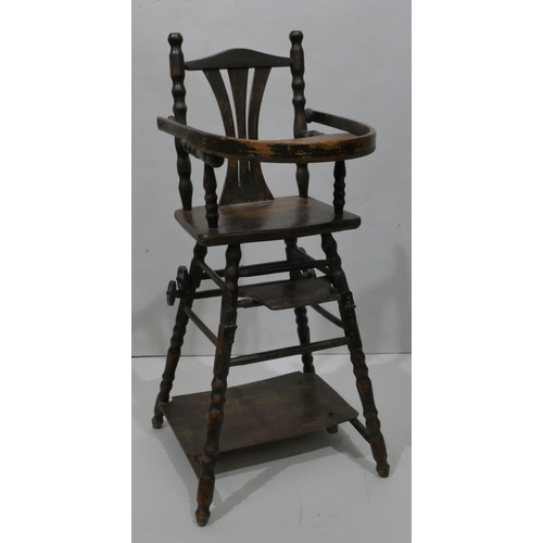 820 - A child's doll folding highchair/table on turned legs, 65cm high