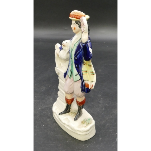 84 - A 19th Century Staffordshire figure of a standing gentleman  standing on a plinth and holding a wrea... 