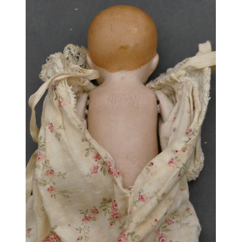 86 - A Japanese Nippon small china doll with jointed body, 13cm high and 2 other Continental porcelain do... 