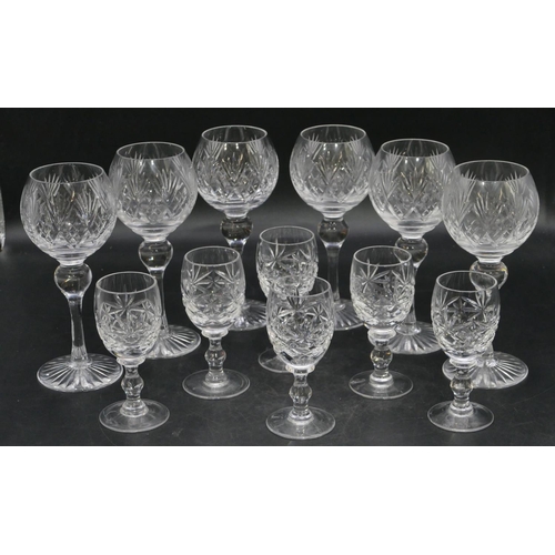 87 - A set of 6 clear cut hock glasses, 17.5cm high and 6 cut liqueur glasses. (12)