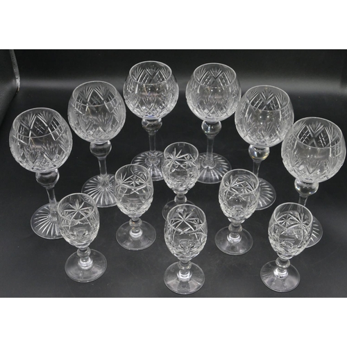 87 - A set of 6 clear cut hock glasses, 17.5cm high and 6 cut liqueur glasses. (12)