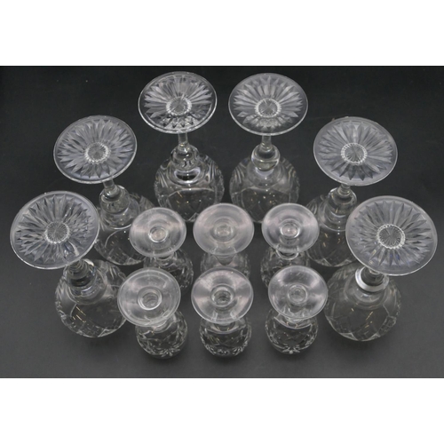 87 - A set of 6 clear cut hock glasses, 17.5cm high and 6 cut liqueur glasses. (12)