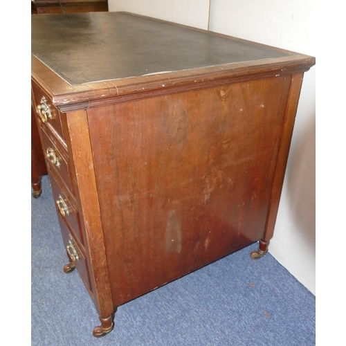 825 - A Victorian walnut knee hole desk with inset top, centre drawer flanked by 8 short graduated drawers... 