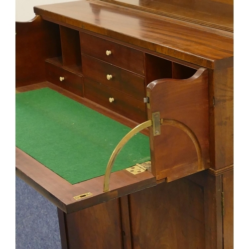 786 - A 19th Century mahogany secretaire chiffonier with shelfed top and turned supports, fitted secretair... 