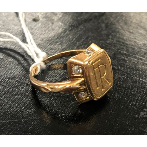 551 - A 14ct gold signet ring engraved FR, mounted with 6 diamonds to sides, size L, 4.5 grams gross.