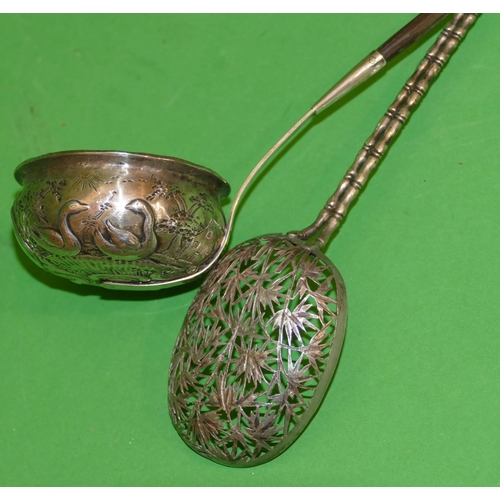 3023 - A Silver Coloured Metal Toddy Ladle having round bulbous shaped bowl embossed with various animals, ... 