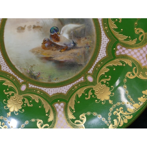 104 - James Stinton Royal Worcester round plate on green ground with hand painted depicting ducks, allover... 