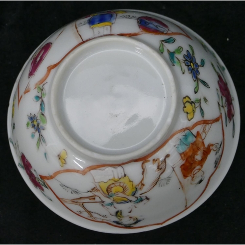 108 - An Oriental tea bowl on white ground with multi-coloured figure, floral and leaf decoration, 7.5cm d... 