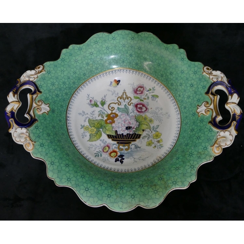 114 - A Victorian china scallop shaped 2-handled comport on white and green ground with multi-coloured vas... 