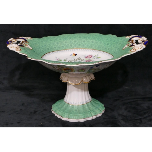 114 - A Victorian china scallop shaped 2-handled comport on white and green ground with multi-coloured vas... 