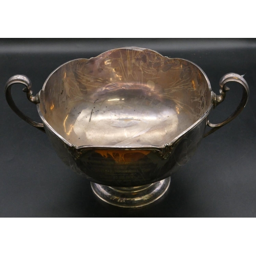 232 - A George V silver round bulbous 2-handled punch bowl/trophy inscribed with 