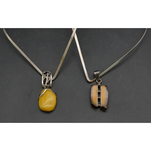 395 - A 925 choker necklace mounted with amber drop, another similar necklace (2)