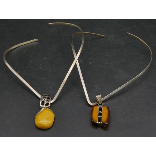 395 - A 925 choker necklace mounted with amber drop, another similar necklace (2)