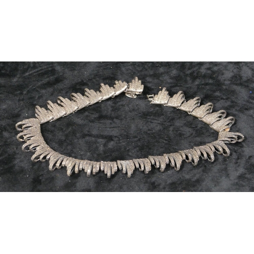 399 - A 925 silver and cut steel necklace, 39cm long, 107.7 grams gross