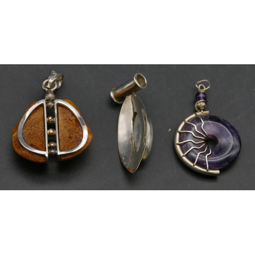 404 - A silver and amber drop pendant and 2 other drop pendants (3)