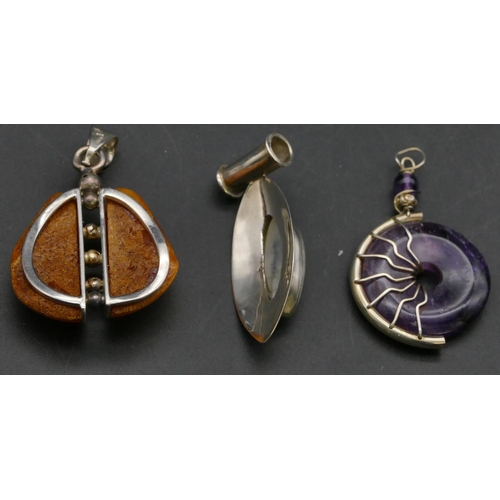 404 - A silver and amber drop pendant and 2 other drop pendants (3)