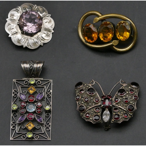 407 - A silver and garnet brooch in the form of a butterfly and 3 other brooches (4)