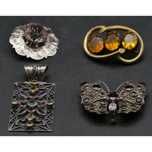 407 - A silver and garnet brooch in the form of a butterfly and 3 other brooches (4)